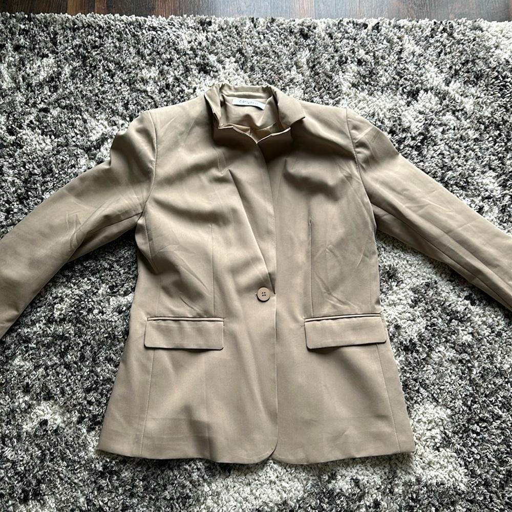 Woman’s blazer brand new never worn
